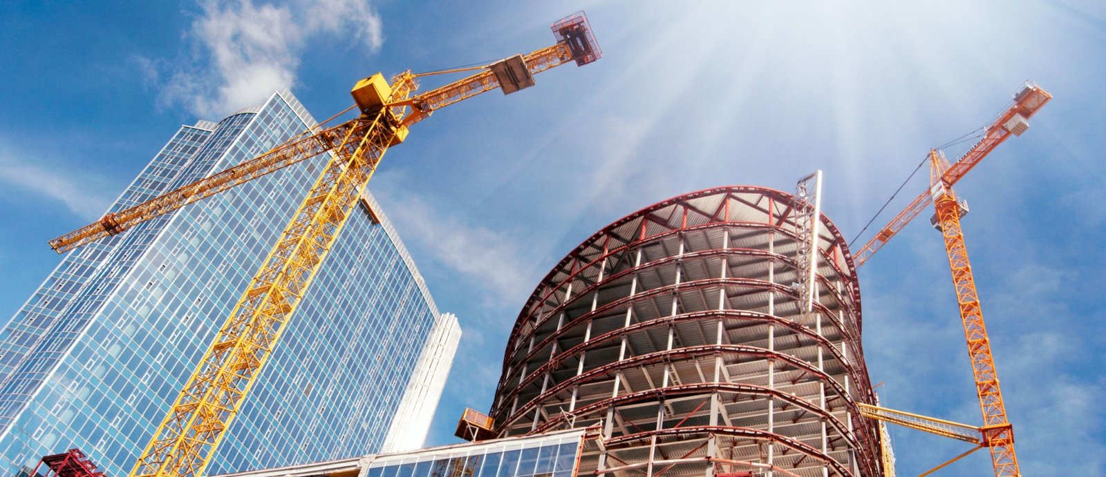 Modern building construction project with tower cranes